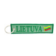 Tekstilinis raktų pakabukas Lietuva žaliame fone
